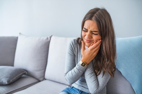 Woman in pain from tooth infection